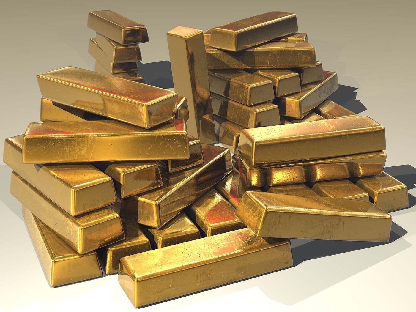 Gold bullion bars. The metal has risen more than 40 percent over the past 12 months.